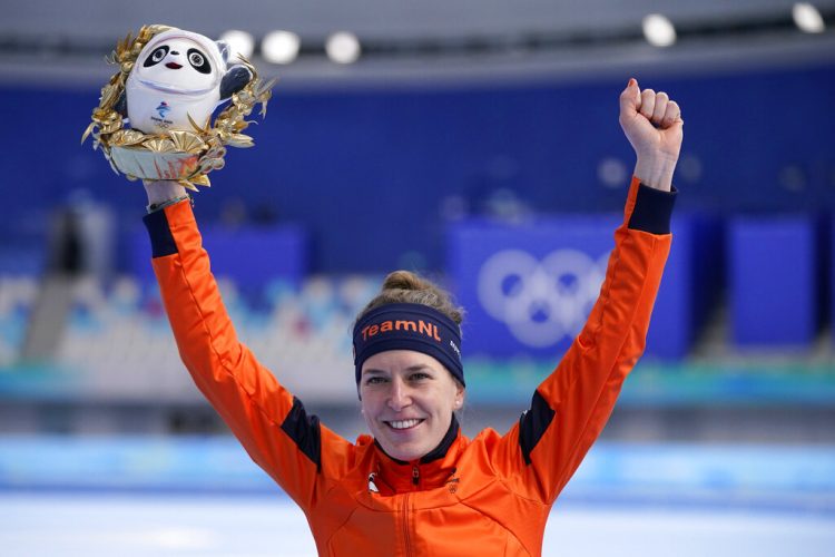 Wüst skates into history with another golden Olympic moment
